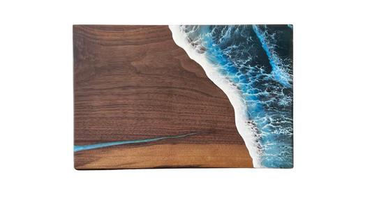 Ocean Wave serving board with blue resin filled crack