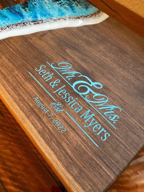 Dark wood ocean wave serving board with Mr & Mrs engraving for a wedding gift